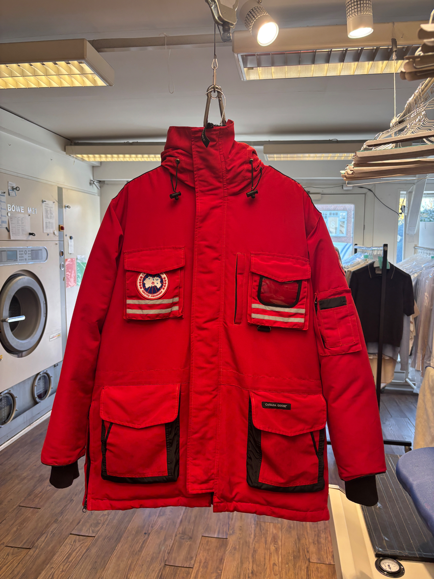 The same red Canada Goose jacket after repair and thorough care